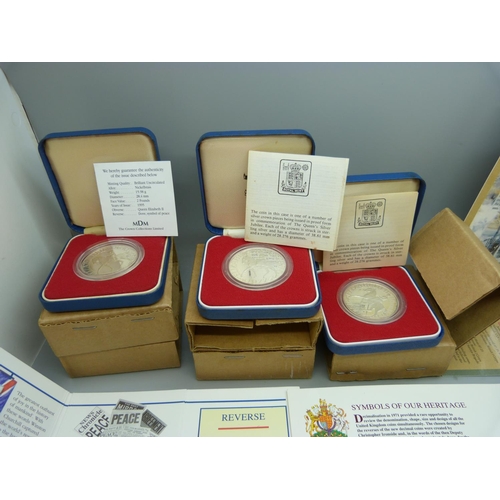 918 - A collection of commemorative crowns and five British decimal coin sets