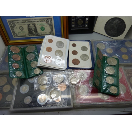 919 - A collection of GB coin sets, framed American coins, Famous Presidents of the USA, a framed Elvis st... 