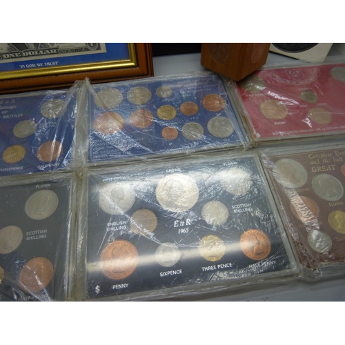 919 - A collection of GB coin sets, framed American coins, Famous Presidents of the USA, a framed Elvis st... 