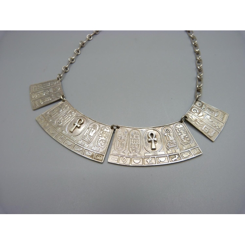 922 - An Egyptian silver necklace, 40cm