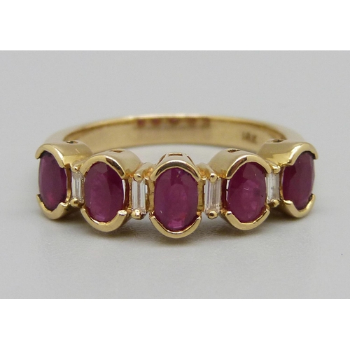 929 - A 9ct gold, ruby and diamond ring, 4.8g, O