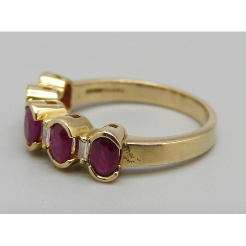 929 - A 9ct gold, ruby and diamond ring, 4.8g, O