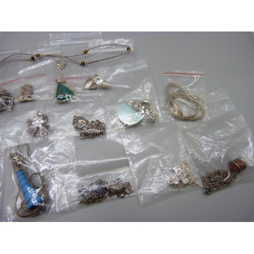 936 - Eighteen silver pendants and chains, a silver and tigers eye necklace and a fine silver chain