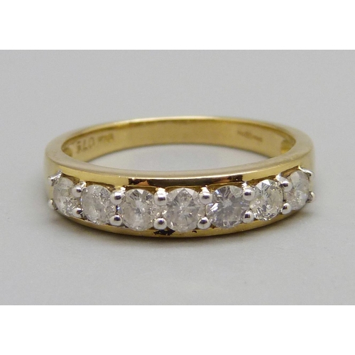 947 - An 18ct gold, seven stone diamond ring, approximately 0.75ct diamond weight, 3.5g, P