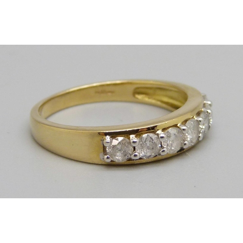 947 - An 18ct gold, seven stone diamond ring, approximately 0.75ct diamond weight, 3.5g, P