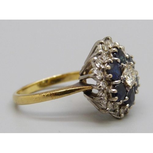 949 - An 18ct gold, sapphire and diamond cluster ring, 6.5g, O, nineteen diamonds approximately 1ct weight... 