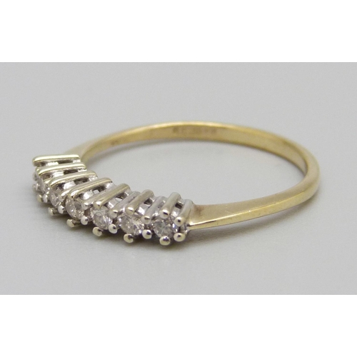 951 - A 9ct gold, seven stone diamond ring, 1.4g, N