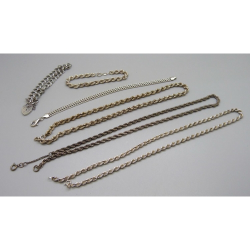 958 - Three silver chains and three silver bracelets, 79g