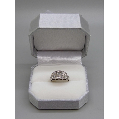 967 - A 1920's Art Deco thirteen stone diamond ring, 2.8g, L, 0.50ct centre stone, total diamond weight ap... 