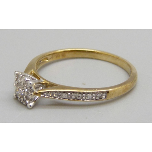 972 - A 9ct gold, diamond cluster ring with diamond shoulders, 1.6g, M