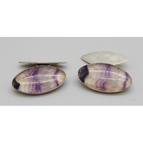 973 - A pair of silver cufflinks set with Blue John, small chip to the Blue John