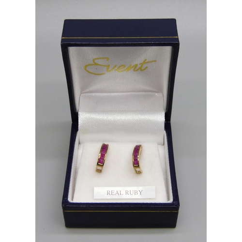 979 - A pair of 9ct gold and ruby earrings, 1.6g, boxed