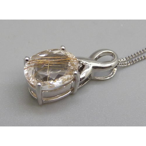 980 - A 9ct gold rutile quartz pendant and chain, 2.9g