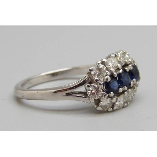 982 - An 18ct white gold, sapphire and diamond ring, 0.80ct diamond weight, 5.2g, N