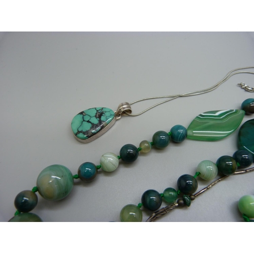 987 - A turquoise pendant, green agate necklace and one other