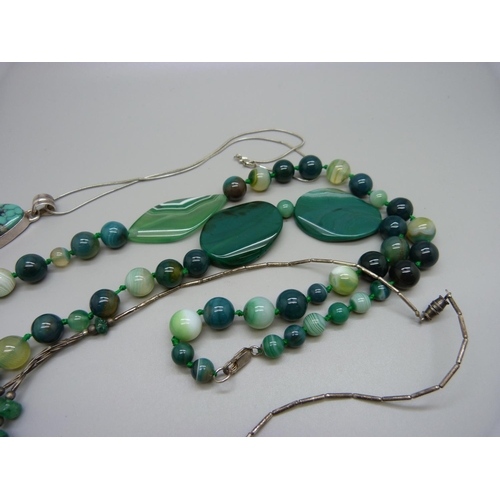 987 - A turquoise pendant, green agate necklace and one other