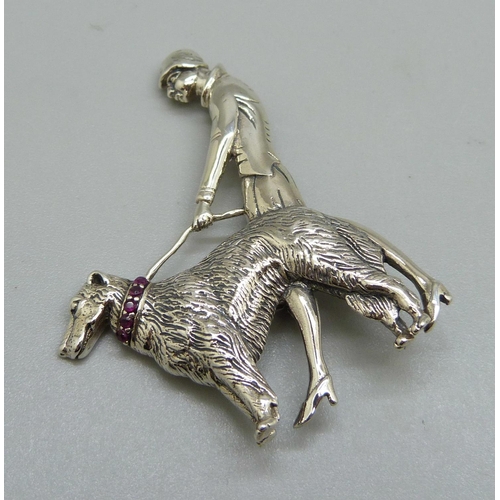 992 - A modern silver Art Deco style lady with dog brooch