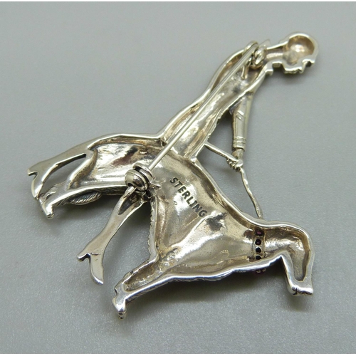 992 - A modern silver Art Deco style lady with dog brooch