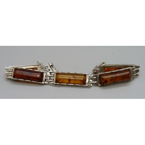 993 - A silver and amber bracelet, marked J.S.