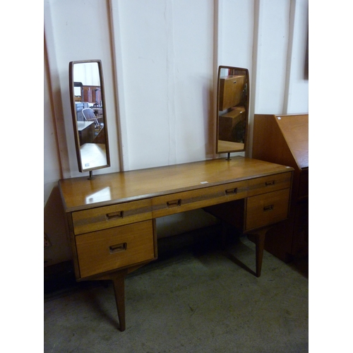 101 - A Butilux teak dressing table