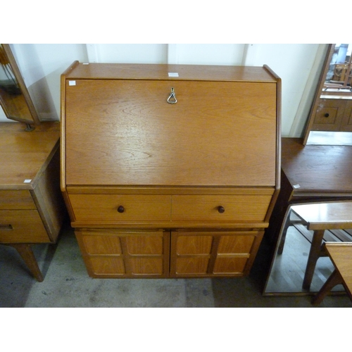 102 - A Nathan Squares teak bureau