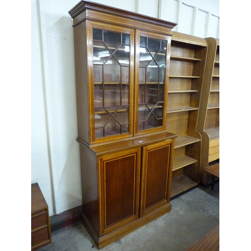 107 - An Edward VII inlaid mahogany bookcase