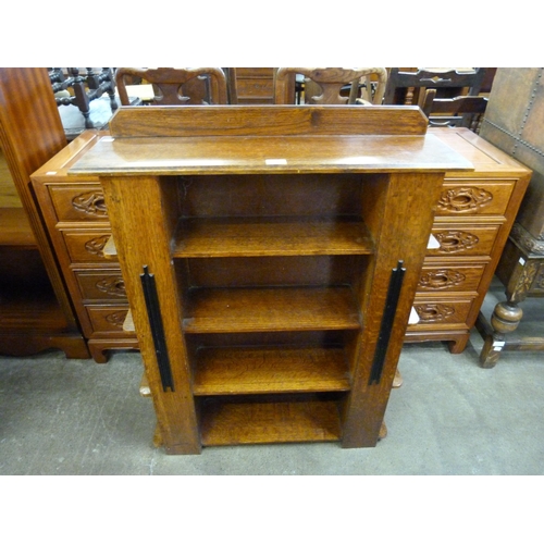 117a - An Art Deco open bookcase