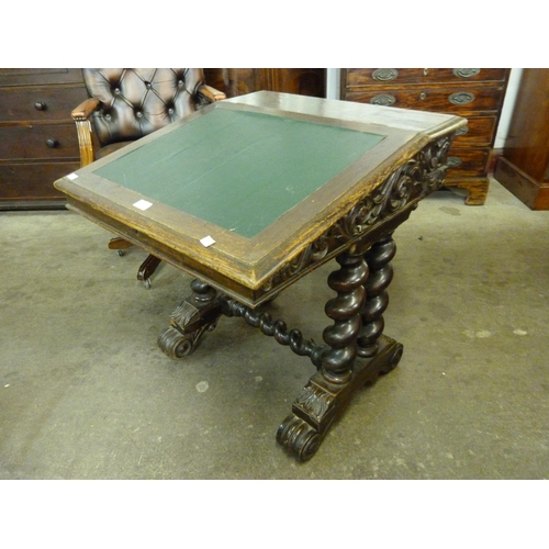 129 - A 19th Century Italian Baroque Revival carved oak Davenport top desk