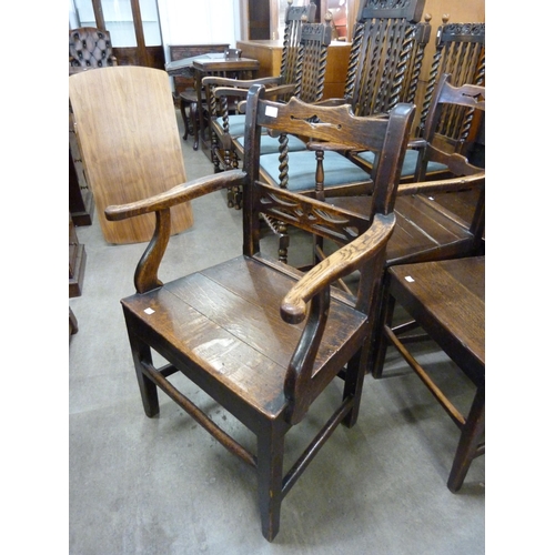 134 - A Harlequin set of six George III oak chairs