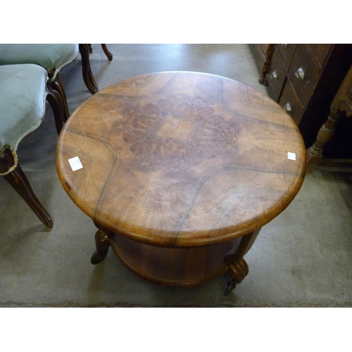 145 - An Art Deco walnut circular coffee table