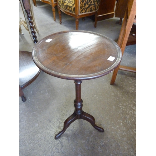 151 - An Edward VII mahogany tripod wine table