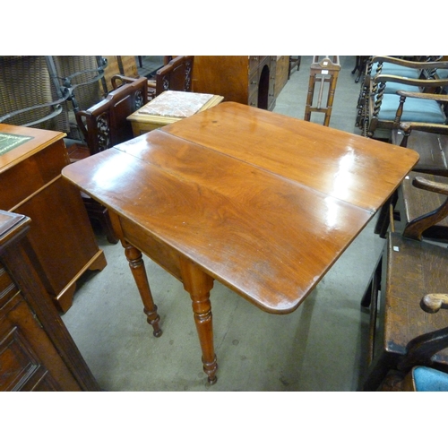 172 - A Victorian mahogany fold-over tea table