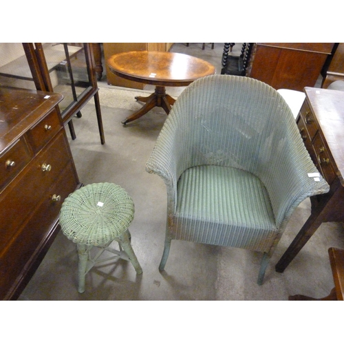 192 - A Lloyd Loom Lusty green wicker chair and stool