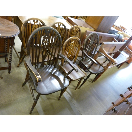 196 - A Harlequin set of six beech wheelback chairs