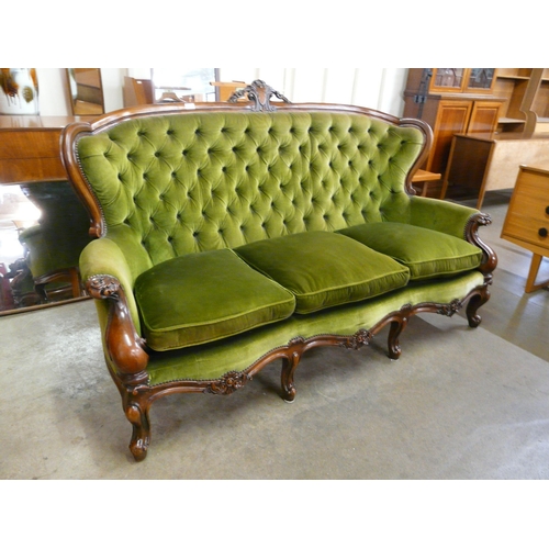 2 - A Victorian style mahogany and green fabric upholstered three piece suite