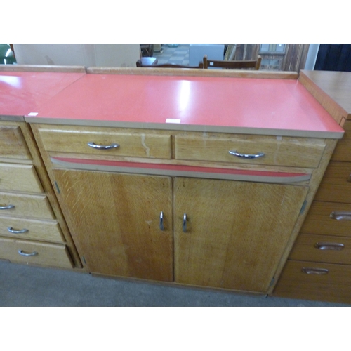 212 - A pair of mid 20th Century light oak and laminated top kitchen cabinets