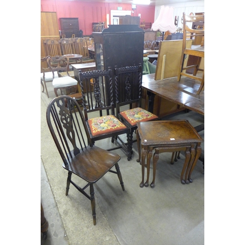 231 - A pair of oak barleytwist chairs, a beech wheelback chair and a walnut nest of tables