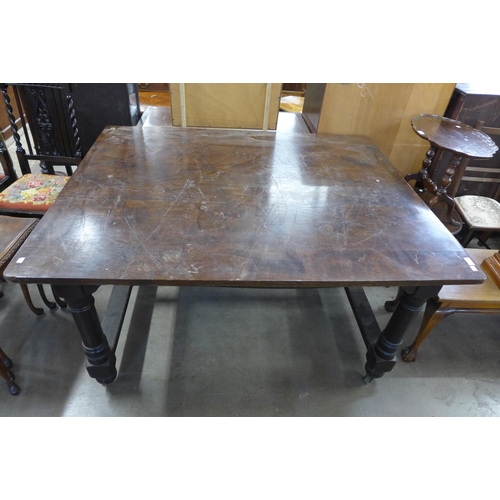 233 - A Victorian painted beech kitchen table with an elm top