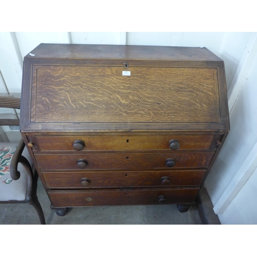 242 - A George III oak bureau