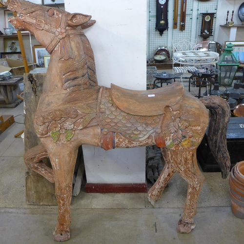 249 - A large carved hardwood carousel style stargazer horse