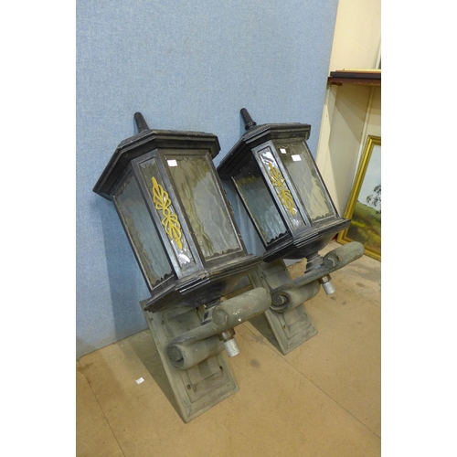 274 - A pair of painted alloy lanterns, on bronze brackets