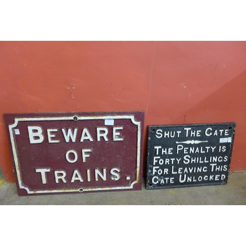 294 - Two cast iron railway signs ' Beware of Trains' 57 x 38cms and 'Shut the Gate' 42 x 32cms