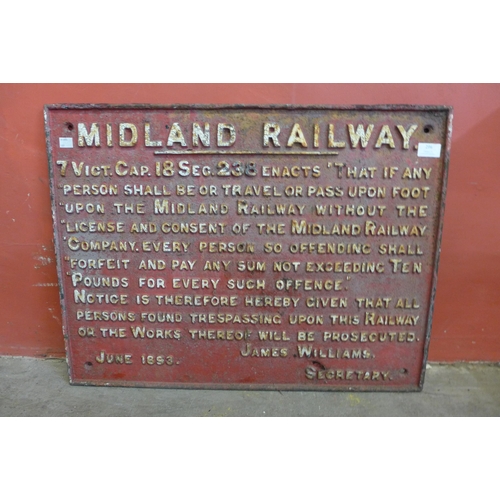 296 - A Midland Railway cast iron trespass warning sign, red with white lettering, 68 x 52cms