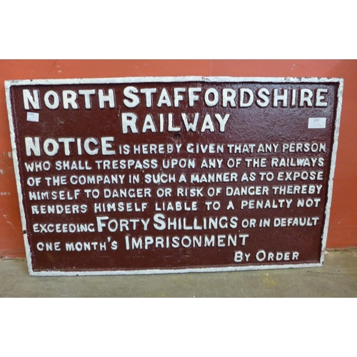 297 - A North Staffordshire Railway cast iron trespass warning sign, brown with white lettering, 68 x 42cm... 