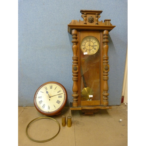 350 - A 19th Century walnut Vienna wall clock and a circular mahogany fusee wall clock