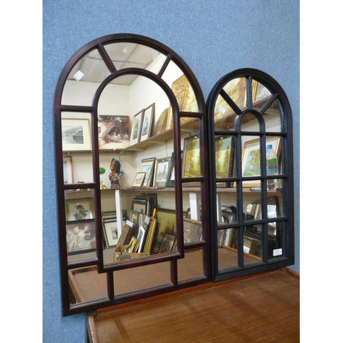 370 - A pair of cathedral style mirrors