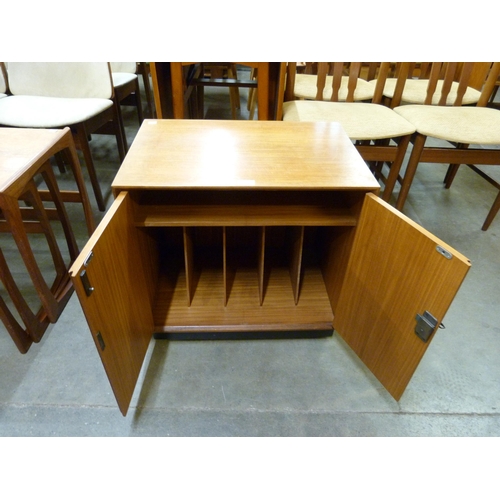 67 - A teak record cabinet