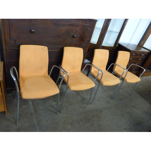 74 - A set of four Akaba Gorka chrome and orange suede chairs, by Jorge Pensi