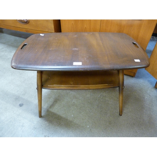 99 - An Ercol Golden Dawn elm and beech butlers tray table