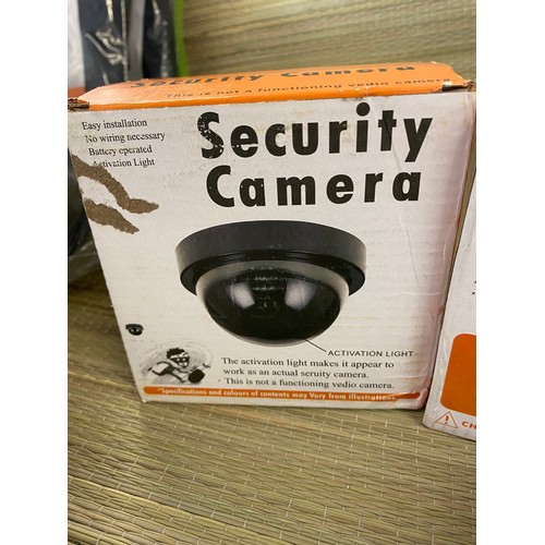 2106 - Four battery powered dummy security cameras, boxed, unused